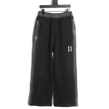 We11 Done colorful spray-trimmed washed wide-leg pants