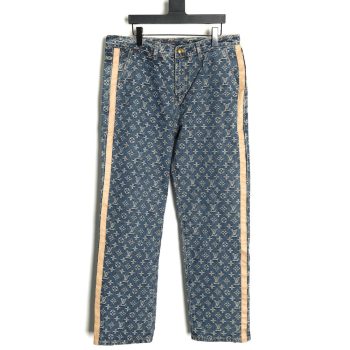 Louis Vuitton washed blue jeans with all-over print and side straps