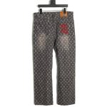 Louis Vuitton printed distressed denim trousers