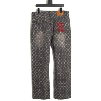 Louis Vuitton printed distressed denim trousers